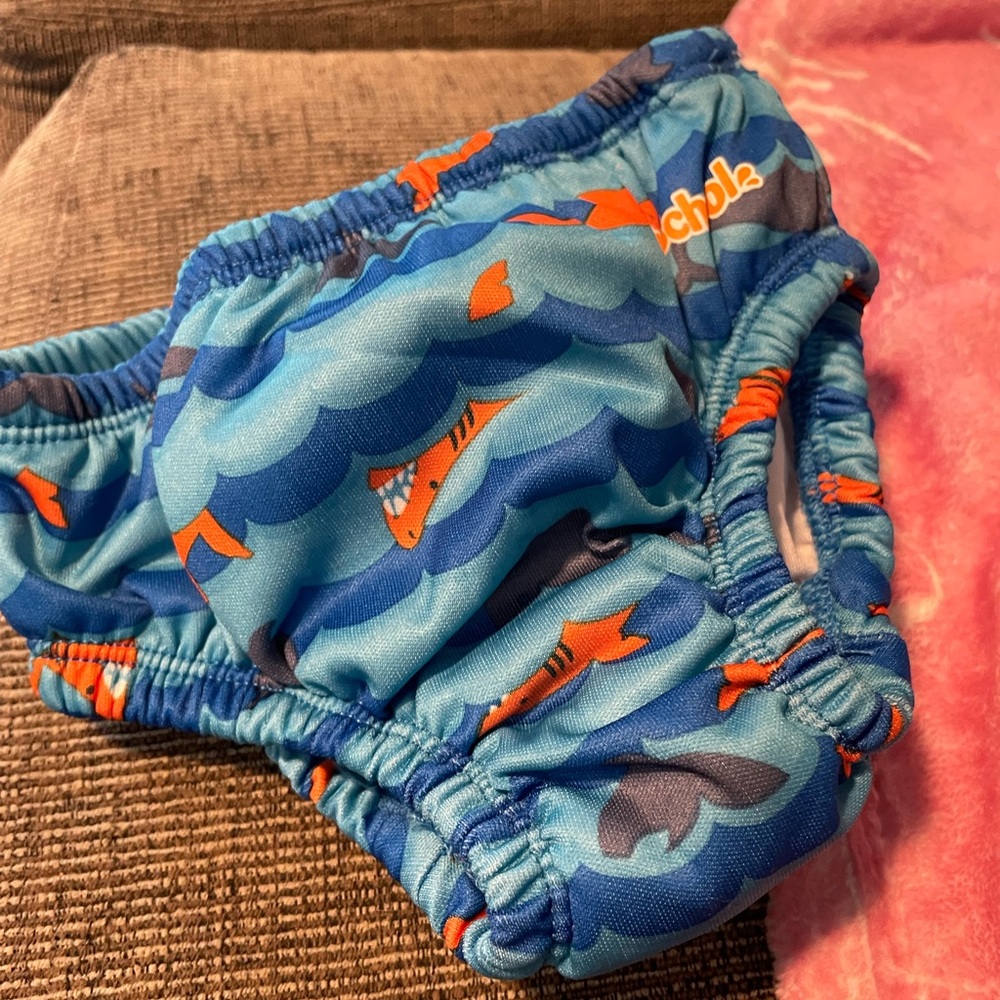 Splashy Kids Swim Diaper - Blue Shark Design small 

Small up to 6 months
One